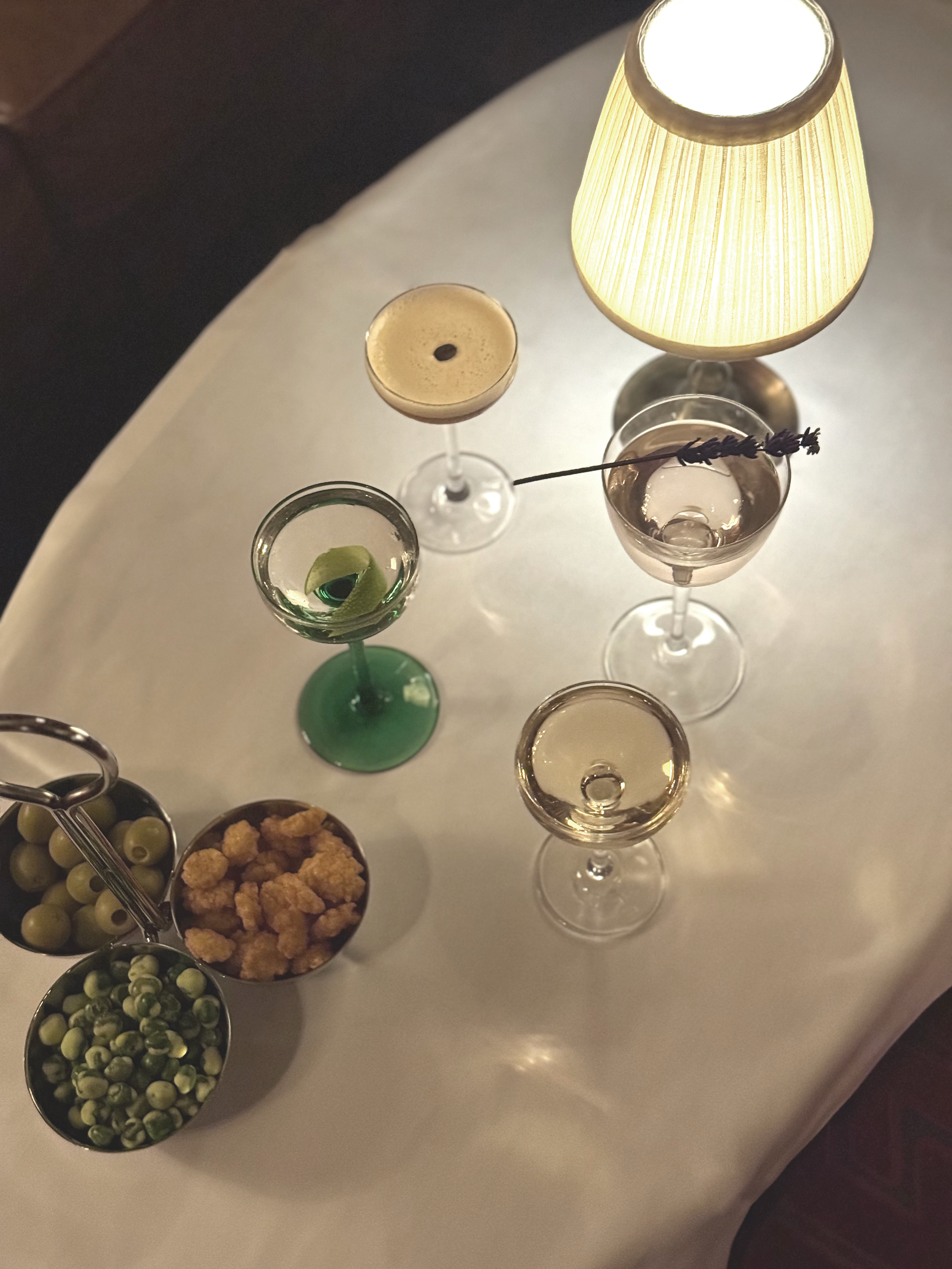 Graphic of a typography specimen showing the alphabet and numerals on top of a dark gray background.