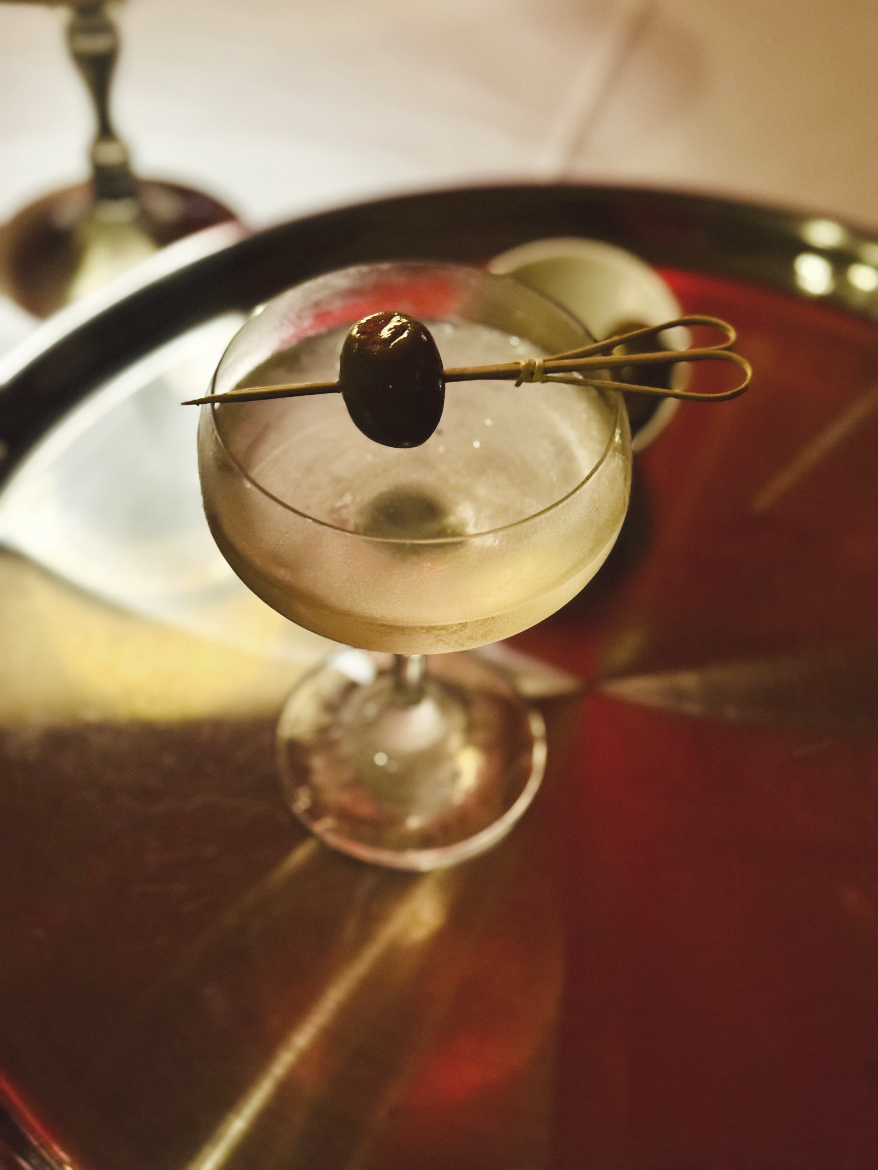 Graphic depicting a hexagonal cropped photo of an interior room design with grid lines along its borders.