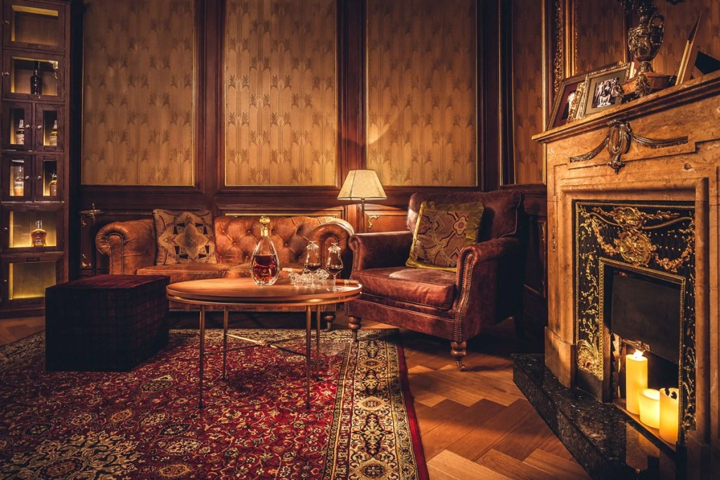 Anders brand wordmark in white placed on top of an image of a modern interior design.